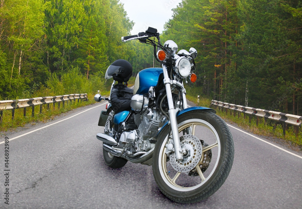 Motorbike on forest road