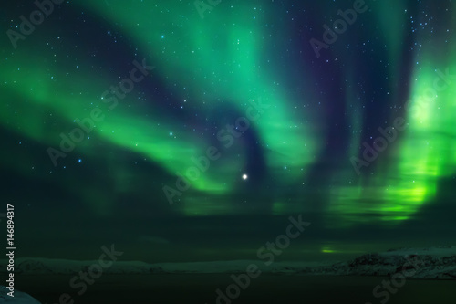 Fototapeta Naklejka Na Ścianę i Meble -  Northern lights. Aurora borealis nature landscape at night