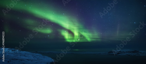 Fototapeta Naklejka Na Ścianę i Meble -  Northern lights. Aurora borealis nature landscape at night