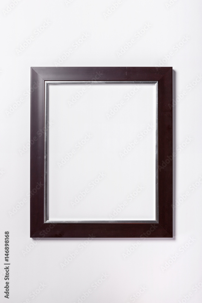 A walnut wood photo(picture) frame) isolated white. A walnut wood photo(picture) frame) isolated white.