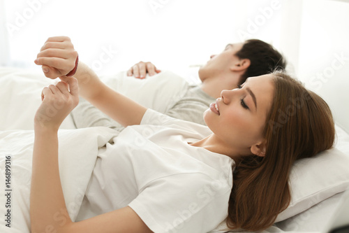 Beautiful young woman with ...