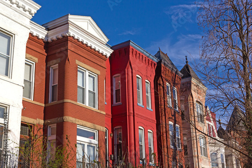 Colorful urban architecture of suburban Washington DC, USA. Historic brick row houses in US capital.
