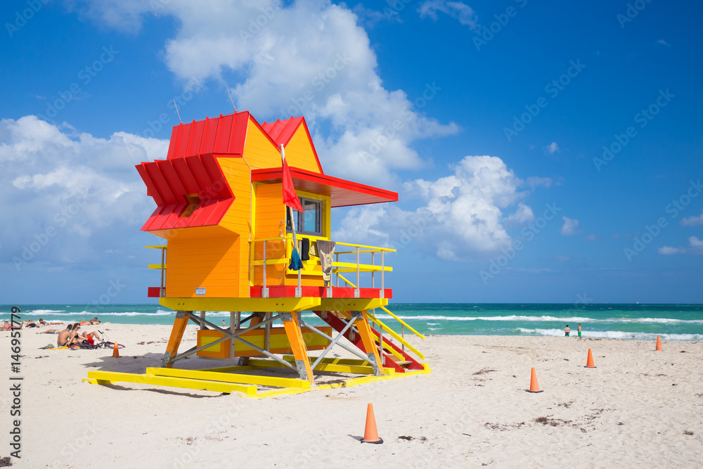USA. FLORIDA. MIAMI BEACH, APRIL,2017: Miami Beach in South Beach with new lifeguard tower and coastline with colorful cloud and blue sky. Florida.