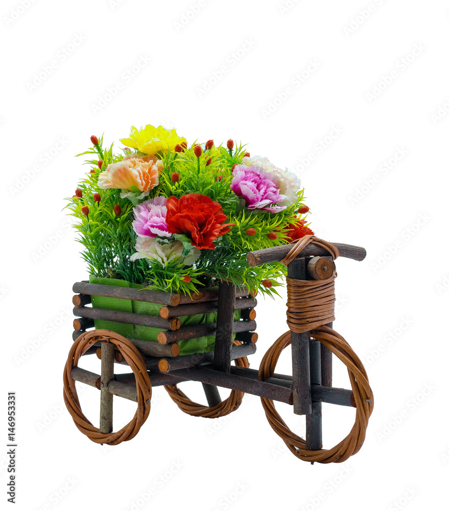 Bunch fake flowers in the wooden bicycle on white background, include clipping path