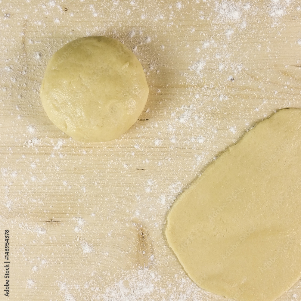 Shortcrust pastry on wooden background - top view Shortcrust pastry on wooden background - top view