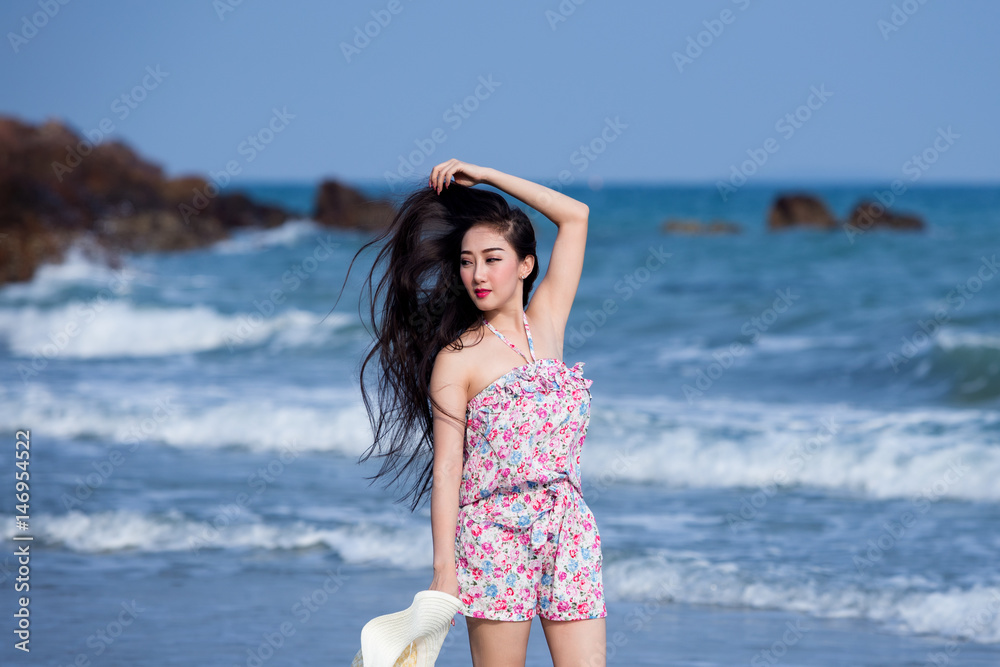 Portrait of young Laos woman wearing hat and bikini enjoy on the tropical  beach Rayong Thailand. фотография Stock | Adobe Stock