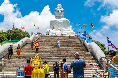 Phuket  Thailand     April 17th 2017 -   Tourists enjoy a hot clear day at Big Buddha.