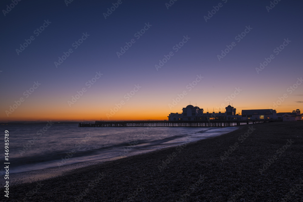 Sunset over pier