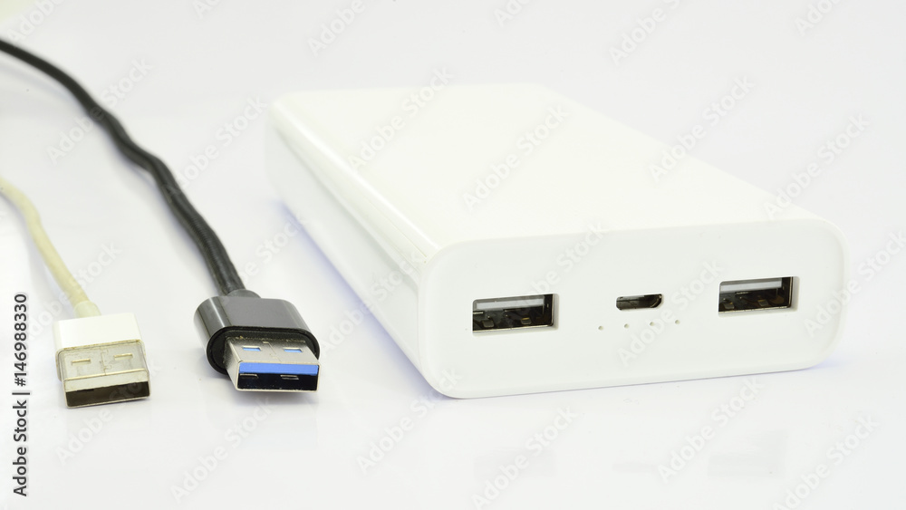 Fototapeta premium Portable power bank for charging mobile devices