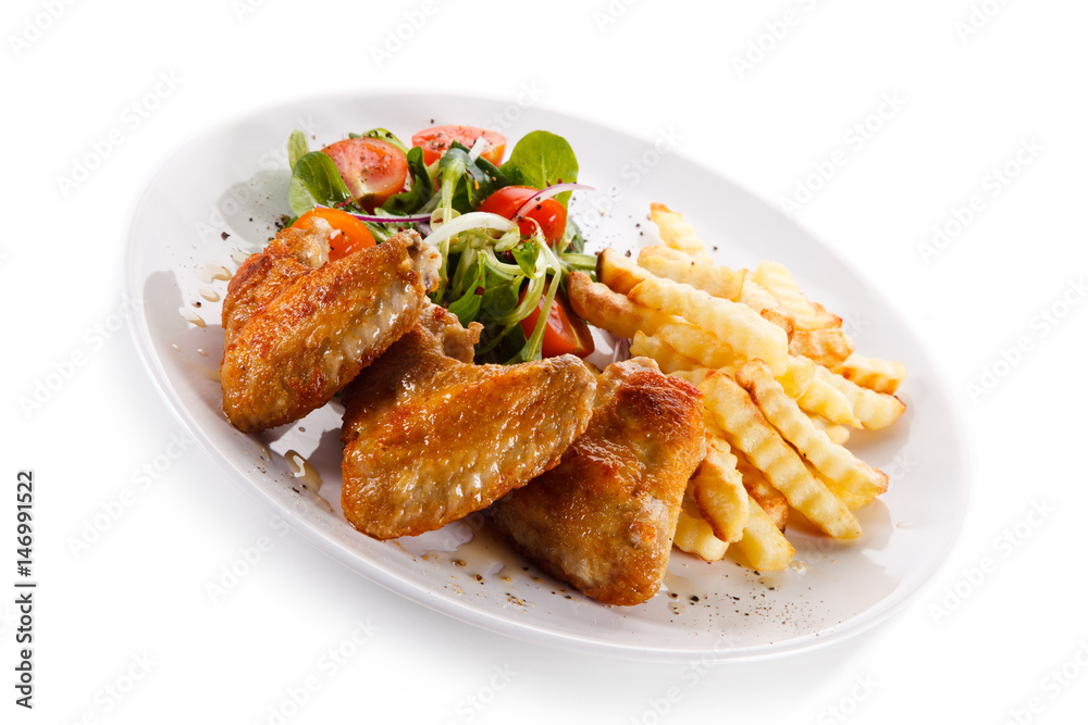 Fried chicken wings with french fries