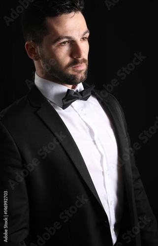 Serious man wearing a tuxedo 
