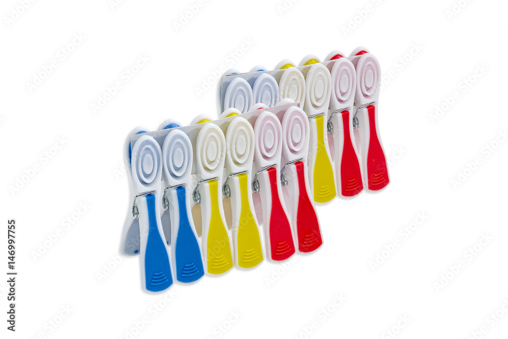 Two sets of the varicolored plastic clothespins Two sets of the varicolored plastic clothespins