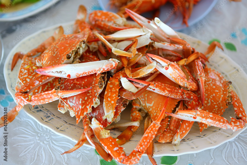 Dish with cooked crabs