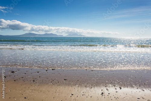Sandy beach at Newborough in Anglesey, North Wales photo
