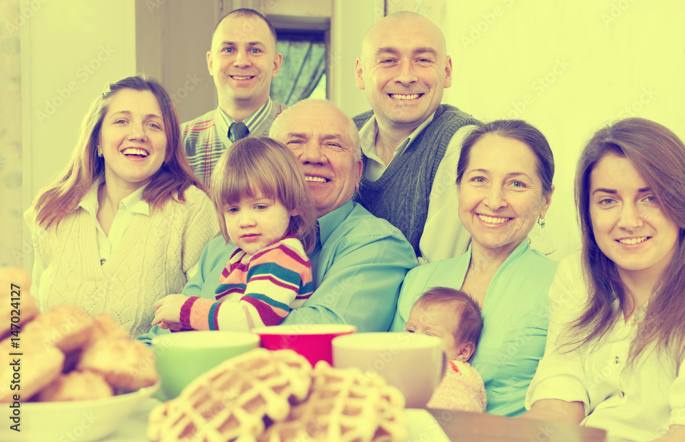 Fototapeta premium large joyful three generations family
