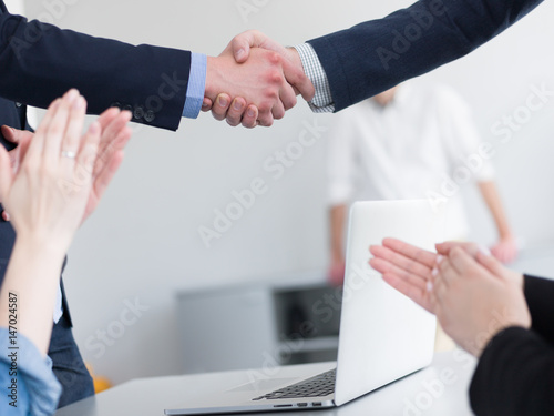 cloasing the deal in modern office interior photo