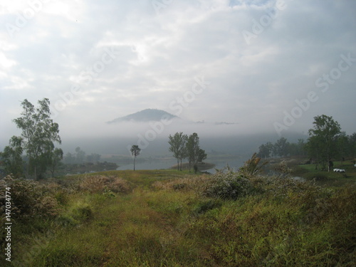 Beautiful landscape in the  forest mountains majestic view Foggy Morning. Fog caused by the Reservoir at Khao Kho National Park  Thailand.