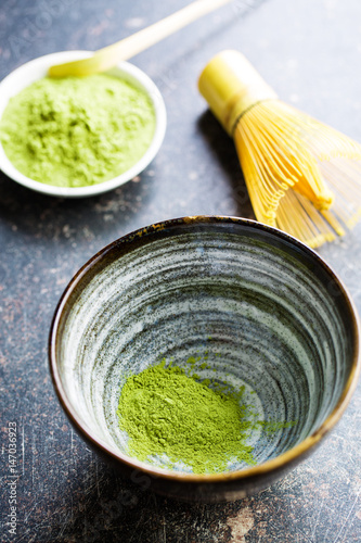 Green matcha tea powder.
