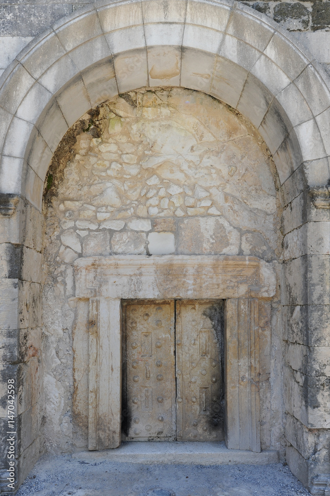 Entrance to the cave tombs in the ruins of the Old City Beit She'arim, Israel