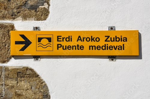 Camino de Santiago, señal de dirección, puente de Zubiri, Navarra, España photo