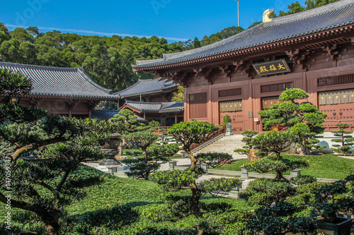 Hong Kong, China, January 30, 2013: Tourists visiting traditional Chinese park in the center of Hong Kong