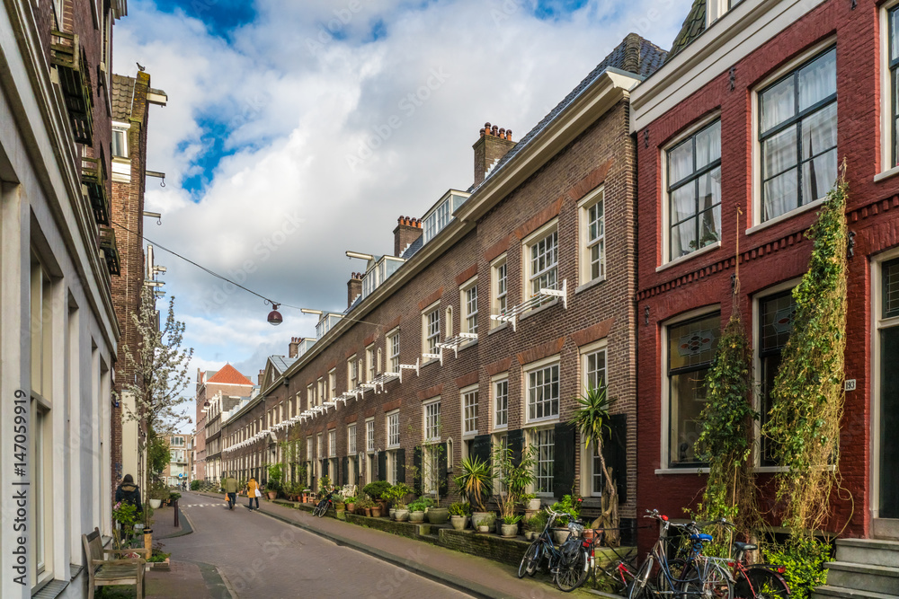 Obraz premium Amsterdam, The Netherlands, April 22, 2017: Old Monastery Karthuizerhof at the Karthuizerstraat in the Jordaan in Amsterdam