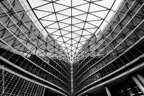 Building with arches and windows example of modern architecture in black and white photo
