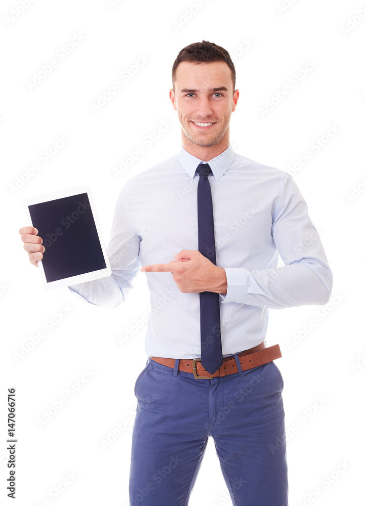 Smiling man in blue shirt pointing to touch screen. Isolated on white background Smiling man in blue shirt pointing to touch screen. Isolated on white background
