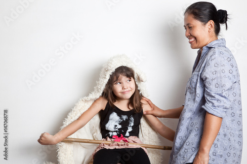 Girl in costume and her nanny 