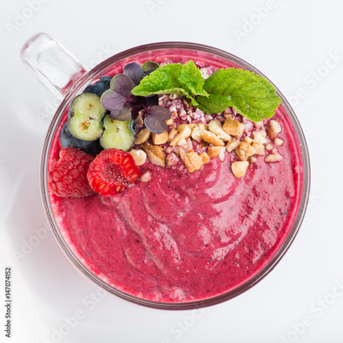 Fruit smoothie in a cup top view