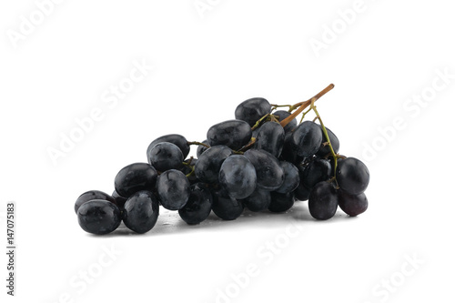 Fresh black grapes with water drops isolated on white background