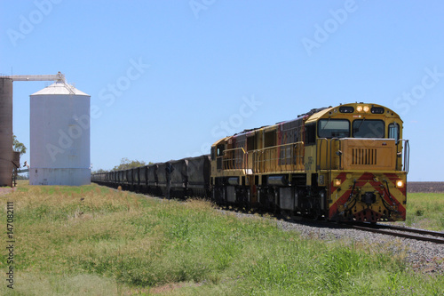 Railway line with coal train close up