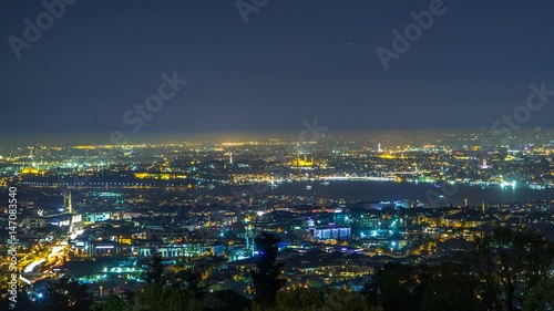 Night timelapse top view of besiktas district in istanbul taken from asian part of the city. photo