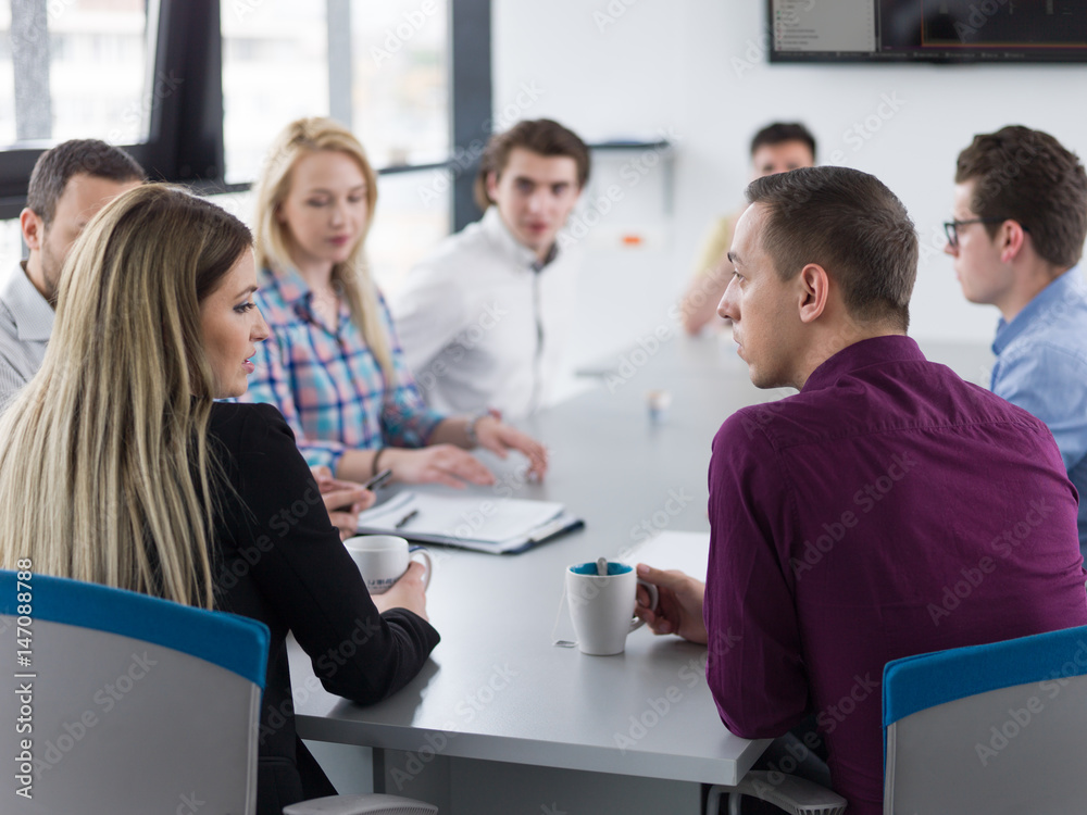 Business Team At A Meeting at modern office building Business Team At A Meeting at modern office building