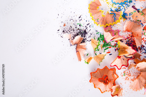 Wooden colorful pencil sawdust and shavings background