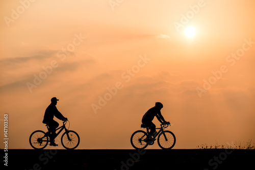 Wallpaper Mural Silhouette of cyclist on sunset background Torontodigital.ca