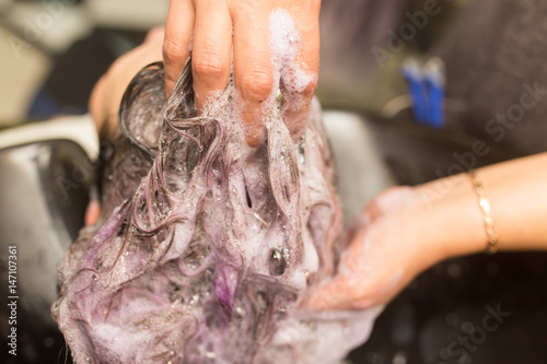 Washing of female hair
