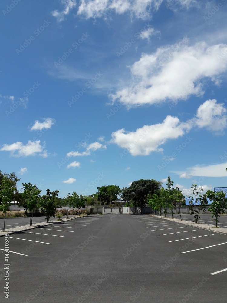 empty parking lot on blue sky background