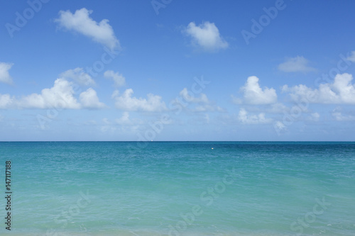 Beach scene Antigua, showing sand, sea and blue sky