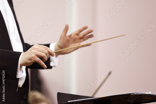 Hands of conductor closeup
