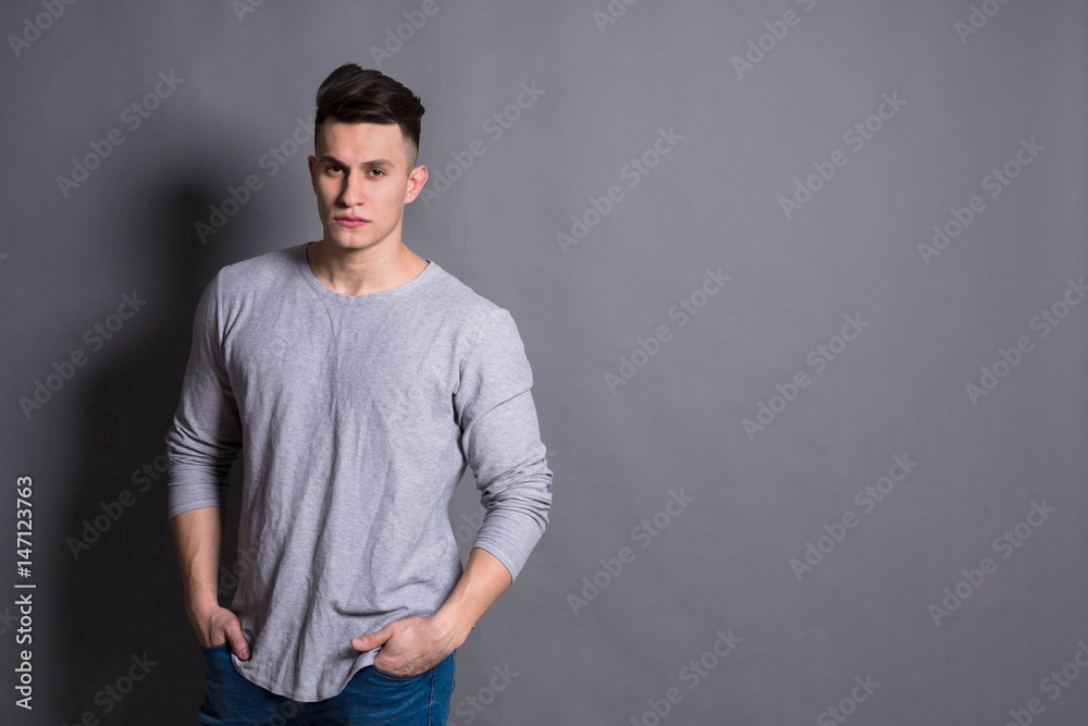 Young handsome man studio portrait, boy style Young handsome man studio portrait, boy style