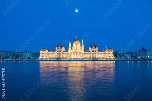 Evening view of the Hungarian Parliament Building on the bank of the Danube in Budapest, Hungary