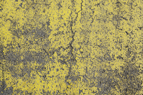 Damaged yellow asphalt