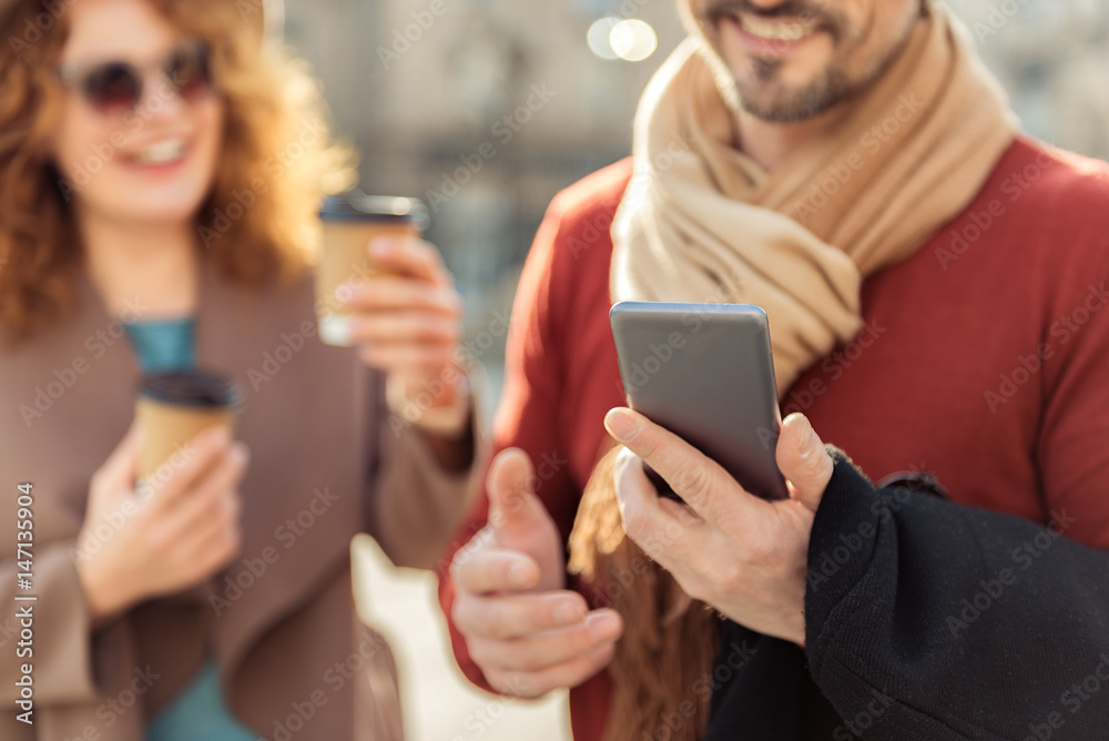 Guy messaging on phone during date Guy messaging on phone during date