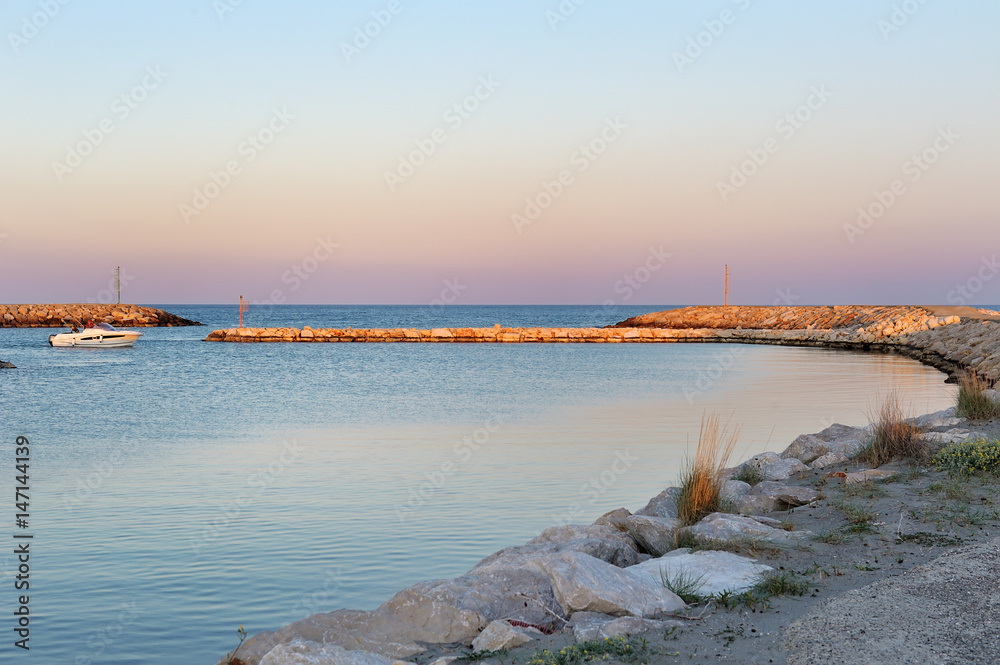 Blue sea and sky in the port, Policoro, Italy