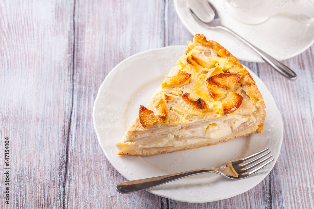 Apple pie, tea in a white cup, horizontally Apple pie, tea in a white cup, horizontally