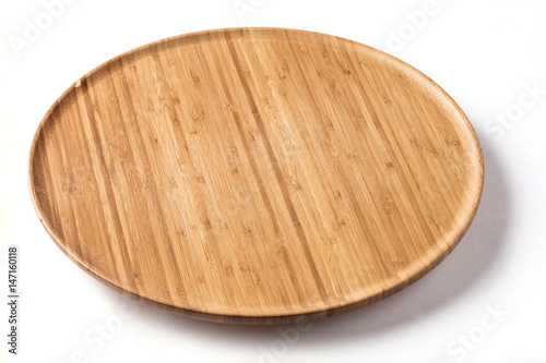 Isolated bamboo lazy susan on a white background photo