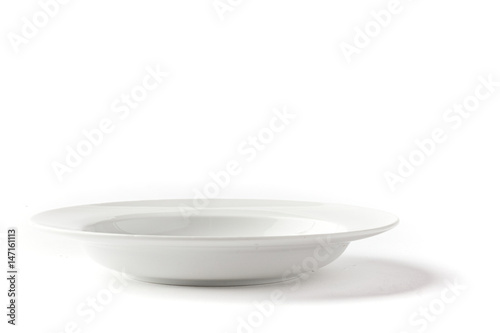 Wide soup bowl on a white background from side view