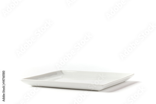 Side view of square white plate