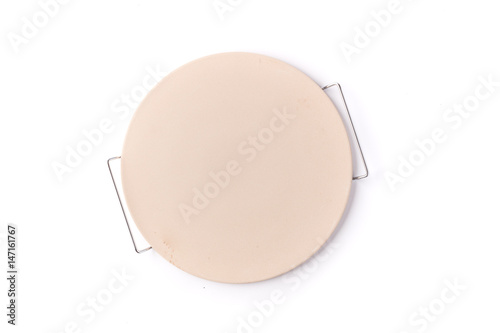 Pizza stone with metal rack on a white background